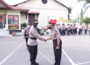 Anggota Polres Bukittinggi Nasril Raih Kenaikan Pangkat Pengabdian