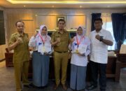 Harumkan Nama Sumatera Barat, Dua Siswi Sawahlunto Raih Juara 1 Kejurnas Bridge Pelajar ke-58 Solo