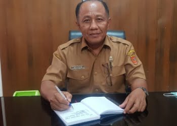 Kepala Disdukcapil Agam, Helton