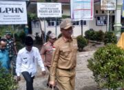 Bupati Solok Selatan Serahkan Bantuan Pangan Beras dan Resmikan Pos Gizi di Nagari Padang Air Dingin