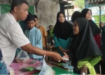 Bantu Anak Yatim dan Dhuafa, Anggota Polsek Lubuk Begalung Dian Pitok Rela Sisihkan Gajinya