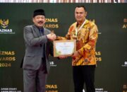 Berkontribusi dalam Pengelolaan Zakat, Bupati Sijunjung Terima Penghargaan dari Baznas RI