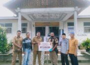 Keluarga Besar IKL Medan Salurkan Donasi Untuk Korban Banjir di Lima Kaum Tanah Datar