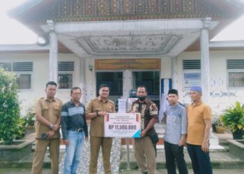 Keluarga Besar IKL Medan Salurkan Donasi Untuk Korban Banjir di Lima Kaum Tanah Datar