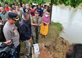 BNPB saat meninjau lokasi terdampak banjir di Pesisir Selatan beberapa waktu lalu. IST/BNPB