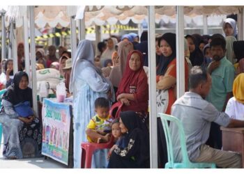 Pemkab Solsel Kembali Serahkan Bantuan Beras untuk 1.126 KPM di Kecamatan Sangir