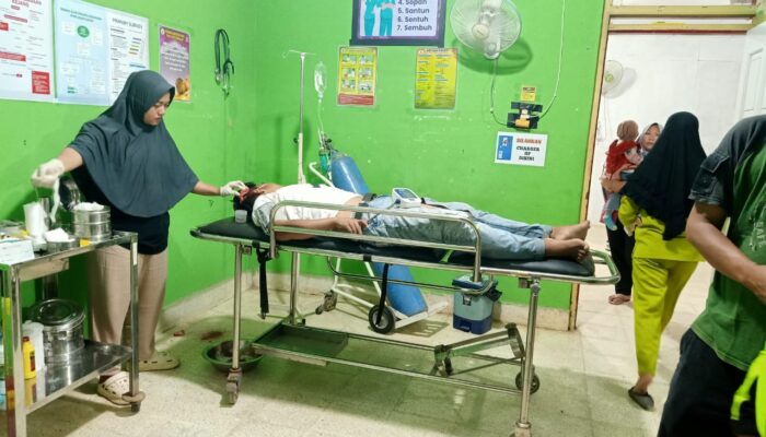 Pengendara Sepeda Motor Bertabrakan dengan Avanza di Jalan Lintas Gunung Medan