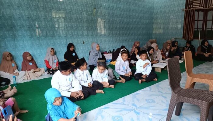 Peringati Isra Mi’raj Bentuk Karakter Anak, Mahasiswa KKN UNAND Gelar Lomba Tahfiz dan Pawai Obor