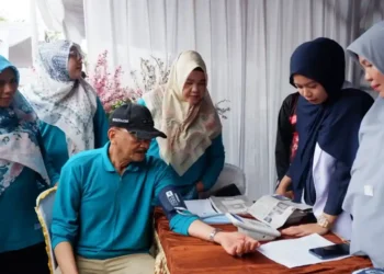Bupati Hendrajoni Hadiri HKN ke-61: Tegaskan Investasi Kesehatan untuk Generasi Muda