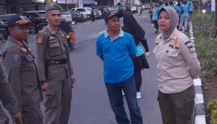 Jaga Ketertiban, Satpol PP Padang Amankan Kegiatan Fun Run Warrior 5K