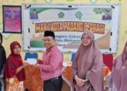 MAN 1 Padang Salurkan Zakat Fitrah dan Bahan Makan Pokok pada Warga Sekitar