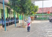 MTsN 1 Bukittinggi Laksanakan Peringatan Hari Lahir Pancasila, Susi Eviyenti Pembina Upacara