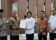 Momentum Hardiknas 2026, Kantah Kota Padang Serahkan Sertipikat Aset POLRI dan Tanah Wakaf