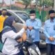 Kabut Asap Menyelimuti Solok Selatan, Kakankemenag Turun Bagikan Ribuan Masker