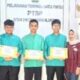 Kepala MTsN 2 Sawahlunto Berikan Penghargaan dan Reward kepada Pemenang dan Pembina OMI