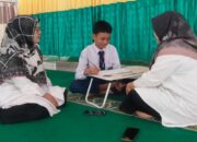 Kepala MTsN 4 Sijunjung Dampingi Pembinaan Siswa OMI M. Iqbal
